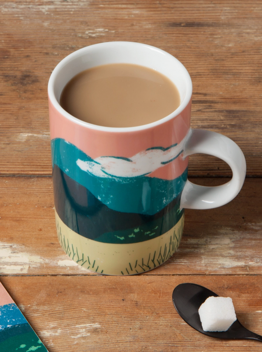 Images of an island paradise meet with heat-preserving ceramic to create the Danica Studio Haven Tall Mug.