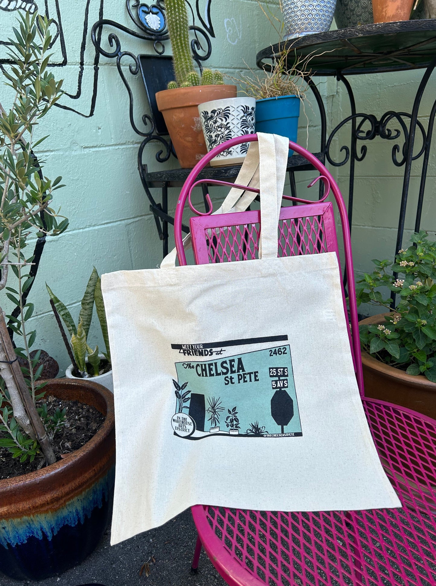 hand screen printed image of the front of the coffee shop on a canvas tote bag